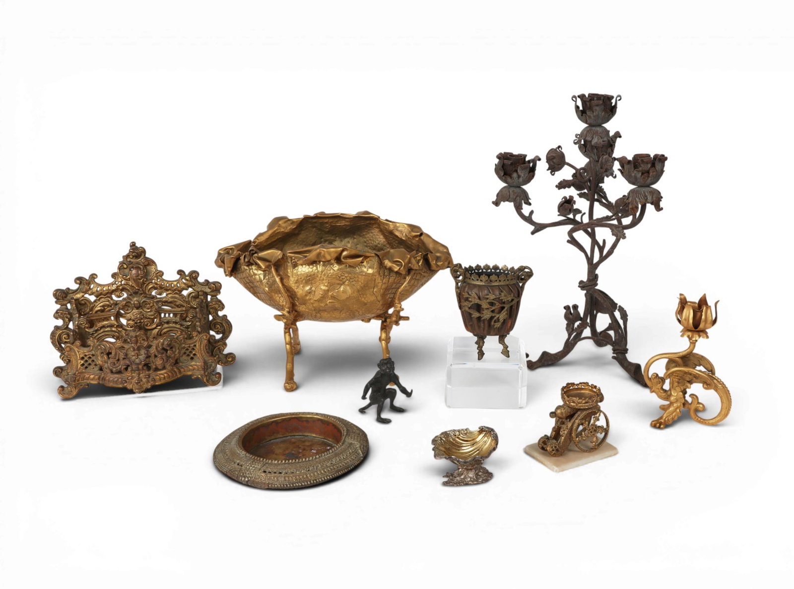 A nine piece collection of mixed metal table decorations (1 of 4)