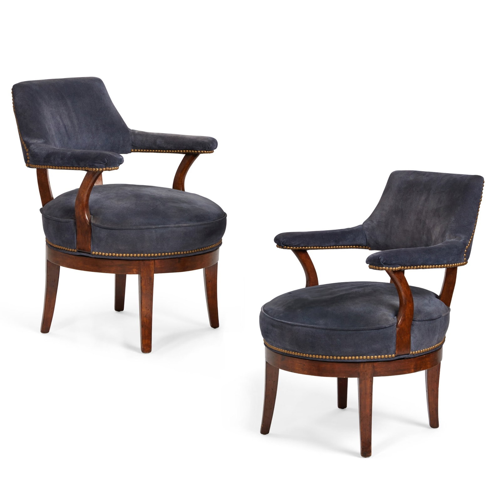 A pair of close nailed blue suede upholstered stained mixed wood swivel desk chairs, modern: A pair of close nailed blue suede upholstered stained mixed wood swivel desk chairs modern height 33 1/2in (85cm); width 26 1/2in (67cm); depth of seat 22in (57cm)