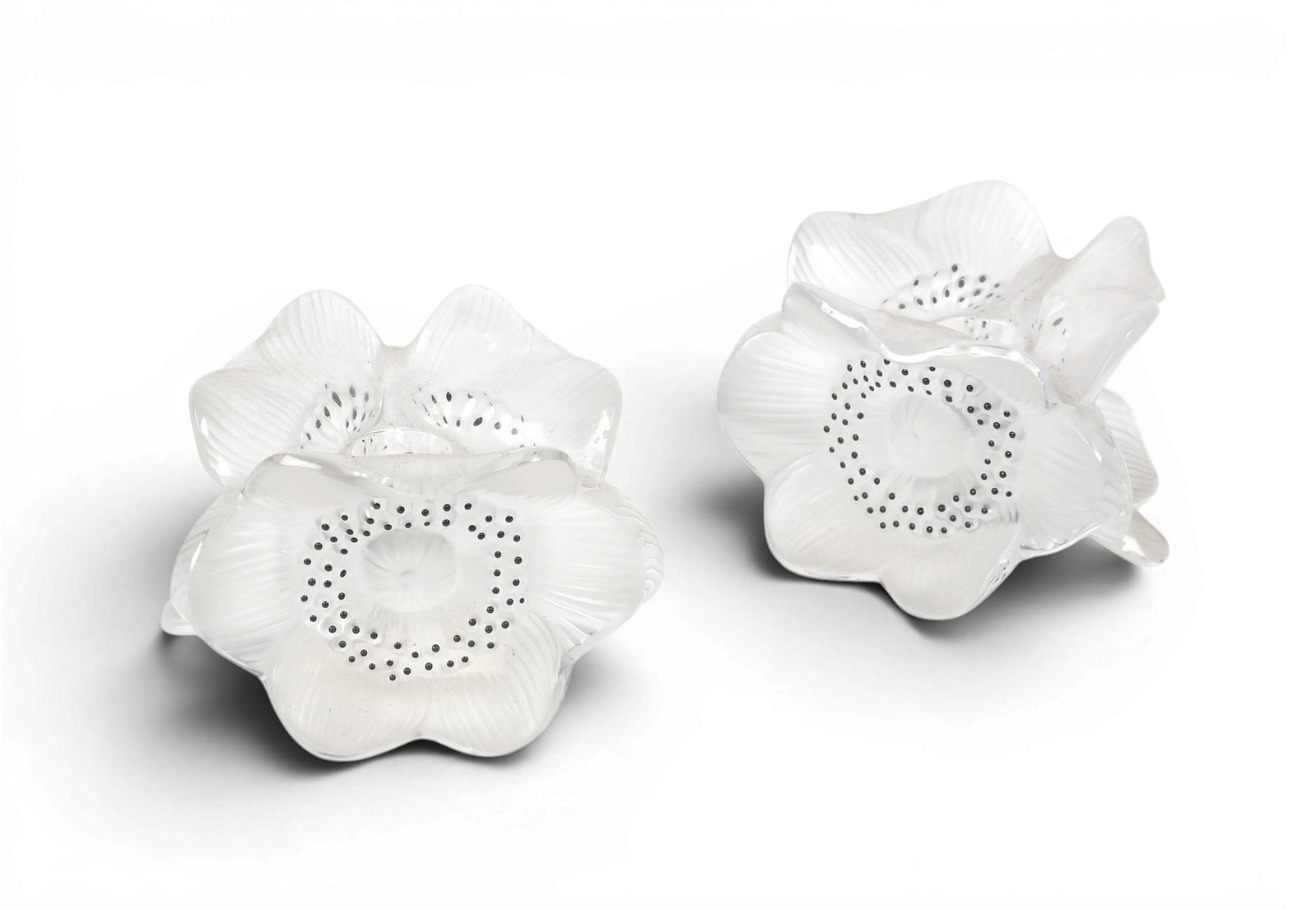 A pair of Lalique frosted glass candle holders: * A pair of Lalique frosted glass candle holders Etched Lalique® France. (2)