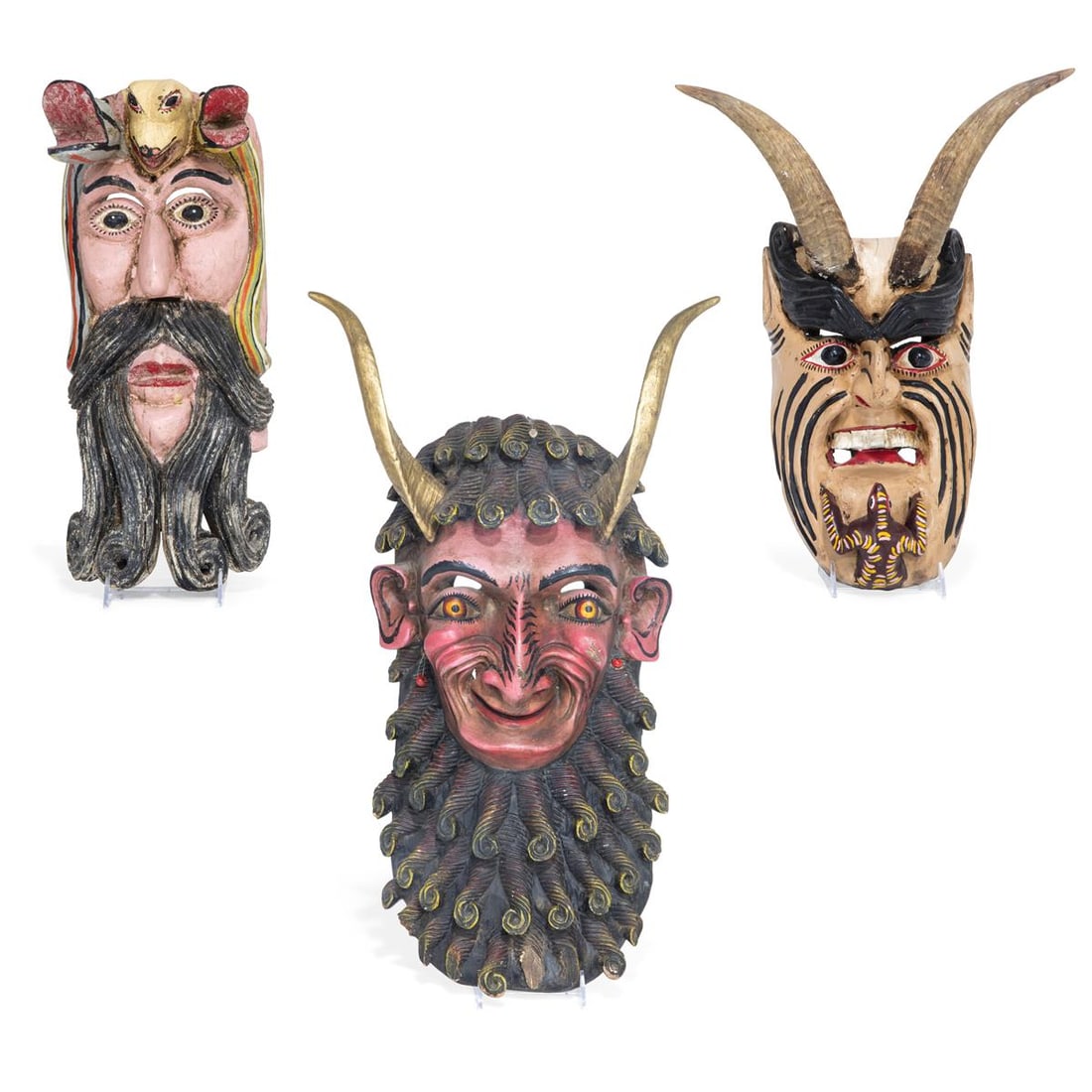Three Mexican polychrome decorated devil form dance masks (1 of 1)