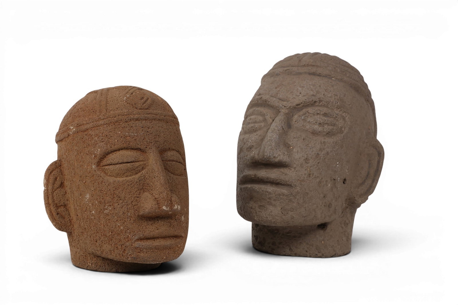 Two Mesoamerican volcanic basalt heads (1 of 4)