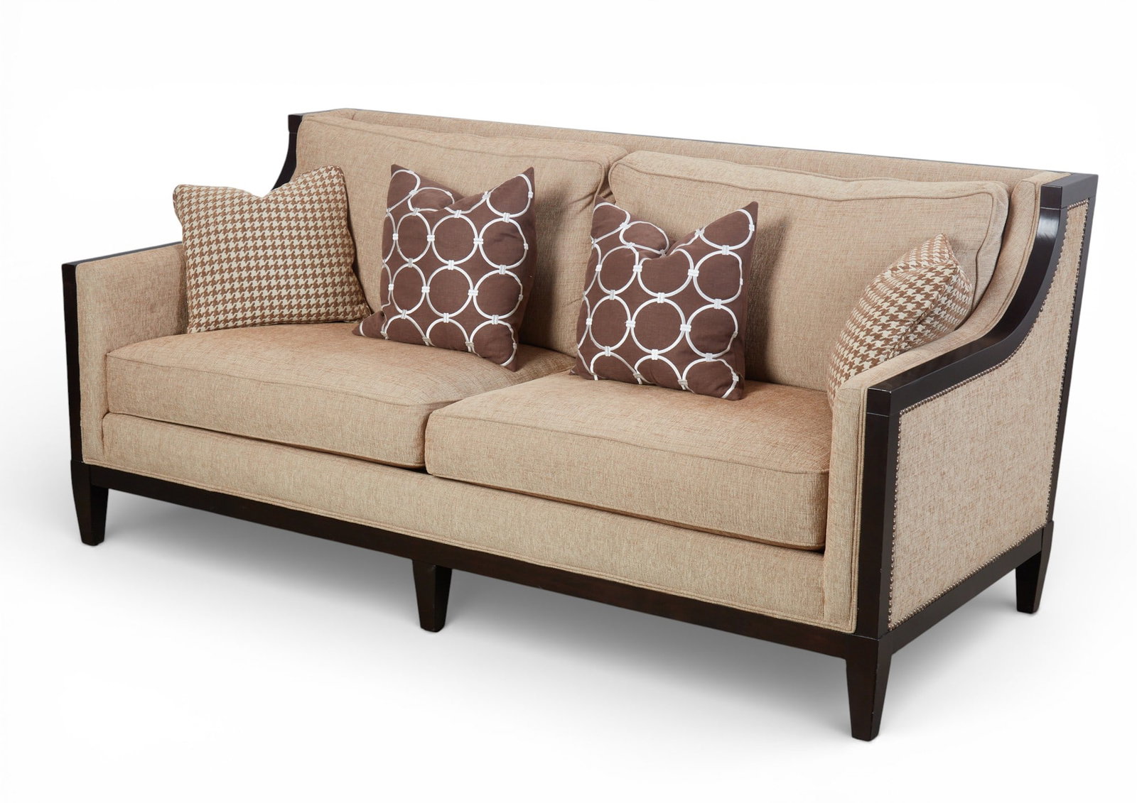 A contemporary upholstered sofa with four associated pillows (1 of 6)