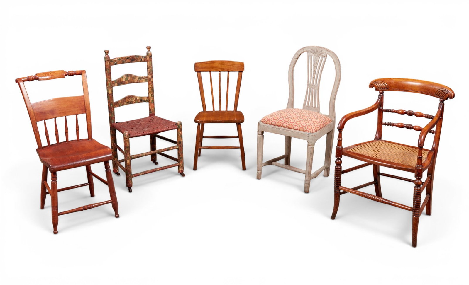 A group of five chairs: A group of five chairs height 36 x width 18 x depth 14 in. (91.4 x 45.7 x 35.6 cm.)