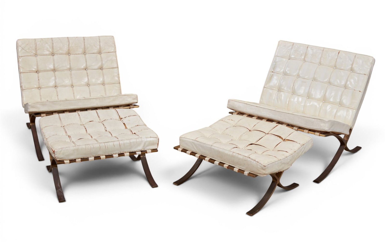 A pair of Barcelona chairs with matching ottomans (1 of 20)