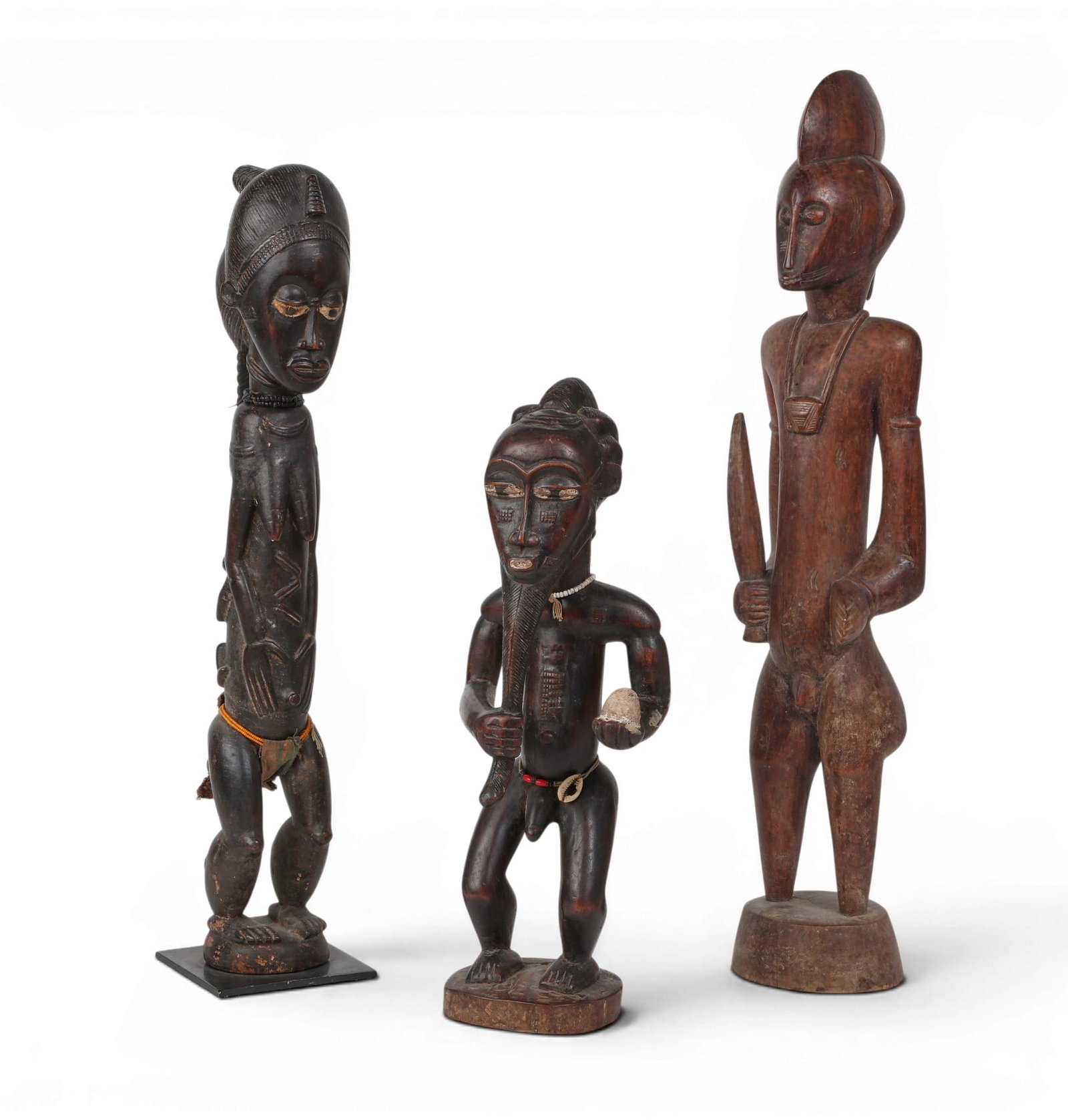 A group of three West African ancestral guardian and fertility fugures (1 of 4)