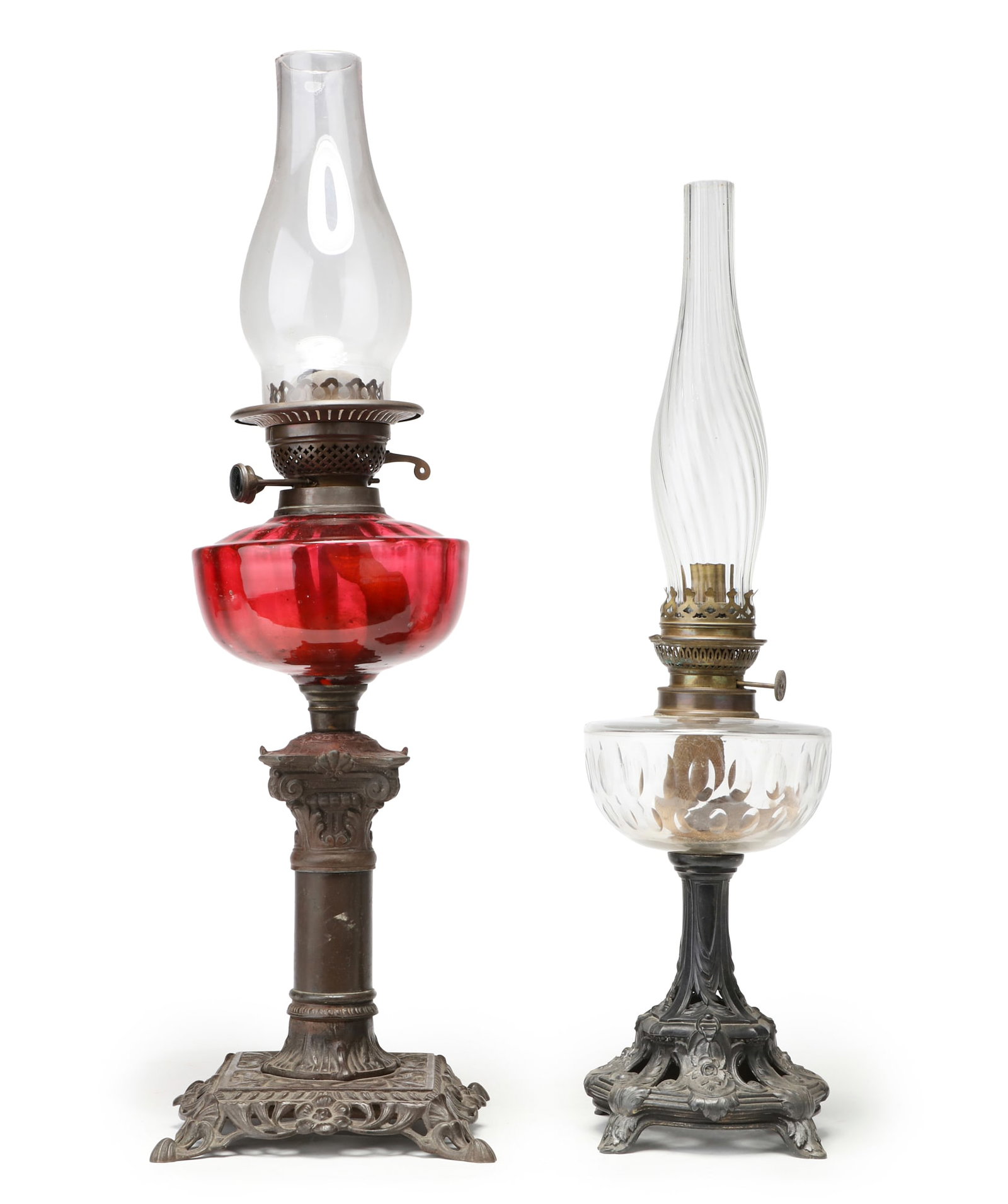 A pair of metal and glass oil lamps (1 of 9)