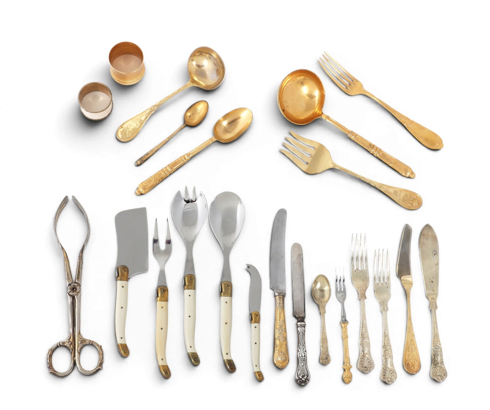 A group of gilt silverplate flatware and twelve napkin rings (approximately 100 pieces), Laguiole (1 of 11)