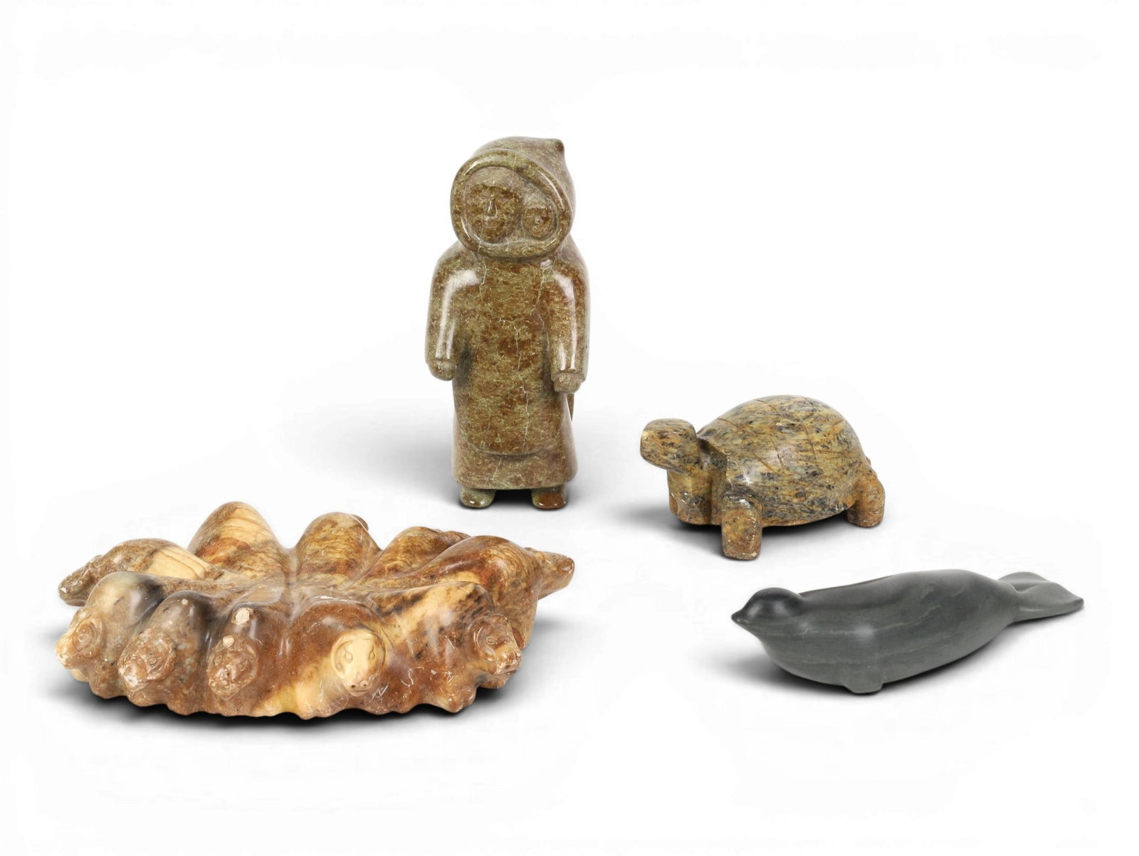 A group of four Inuit stone carvings (1 of 10)