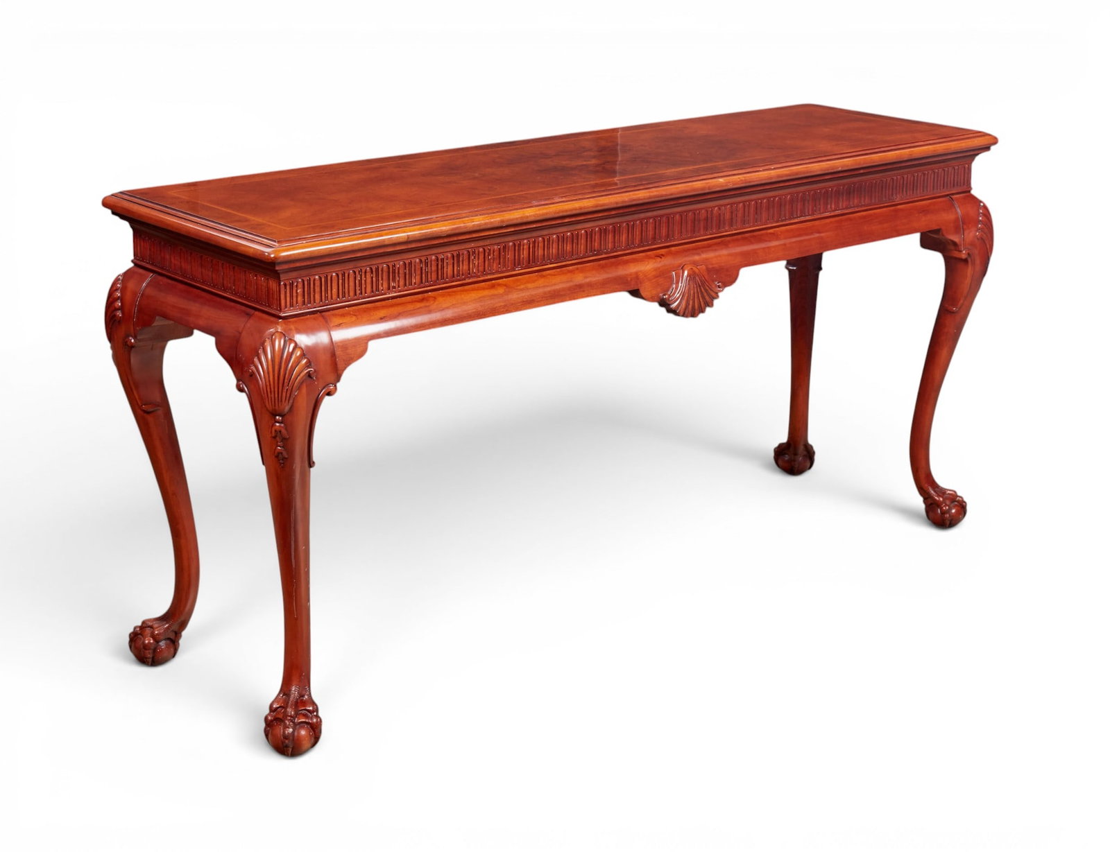 A chippendale style mohagany console: A chippendale style mohagany console height 32 x width 66 x depth 20 in. (81.3 x 167.6 x 50.8 cm.)