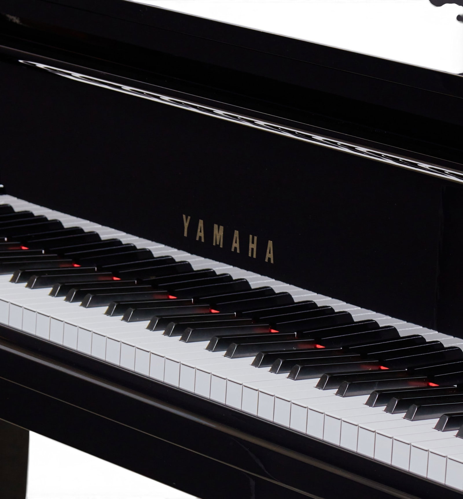 A Yamaha 5' 2" ebonized grand piano, post 1950 - 5