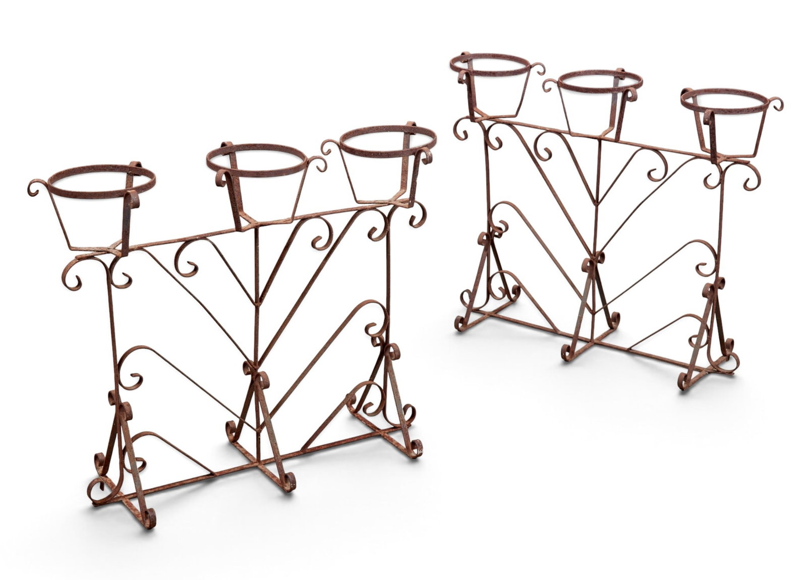 A pair of wrought iron triple ring plant stands, 20th century (1 of 4)