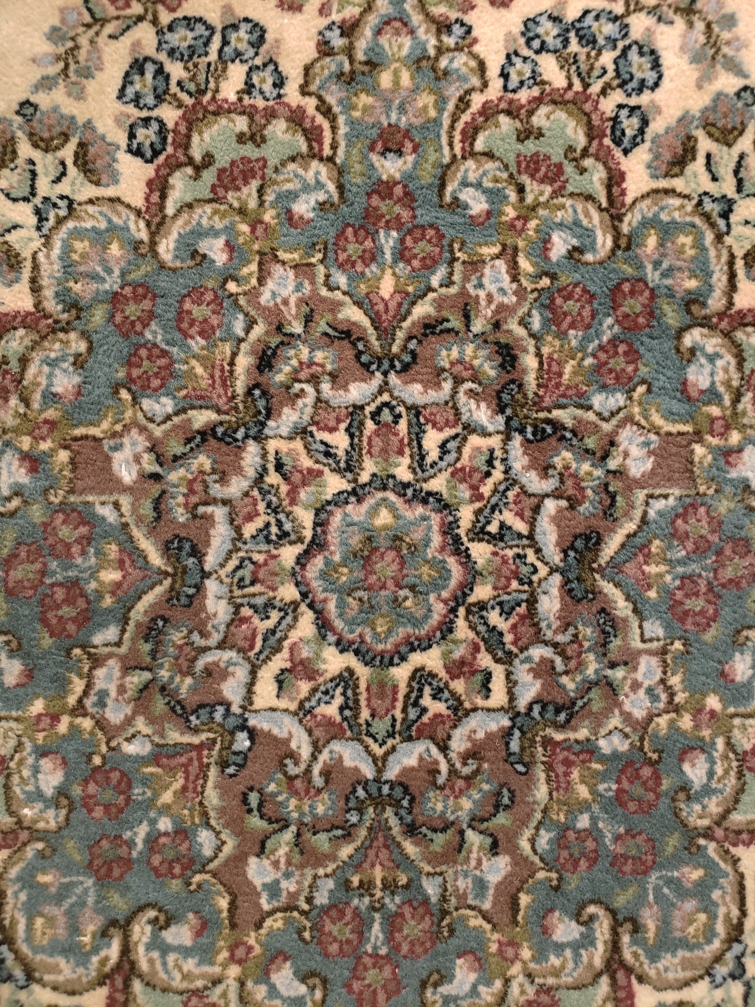A signed Kerman area rug - 2