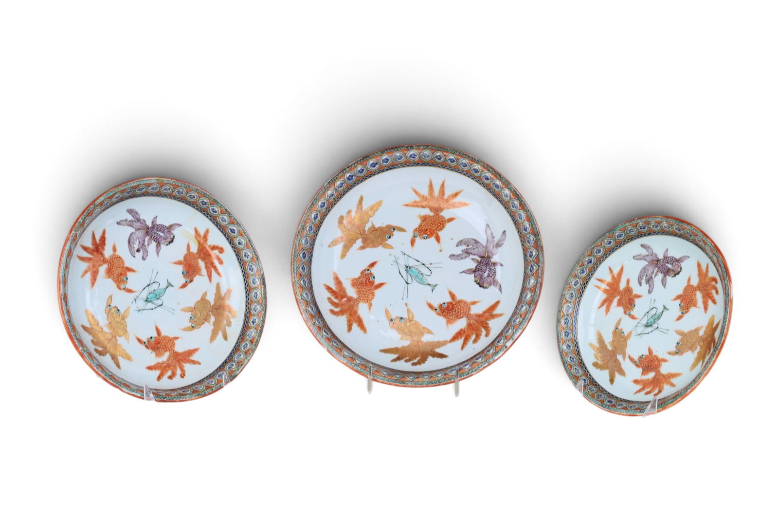 A group of three Chinese painted porcelain shallow bowls: A group of three Chinese painted porcelain shallow bowls Largest: height 2 x diameter11 in. (5.1 x 27.9 cm.)