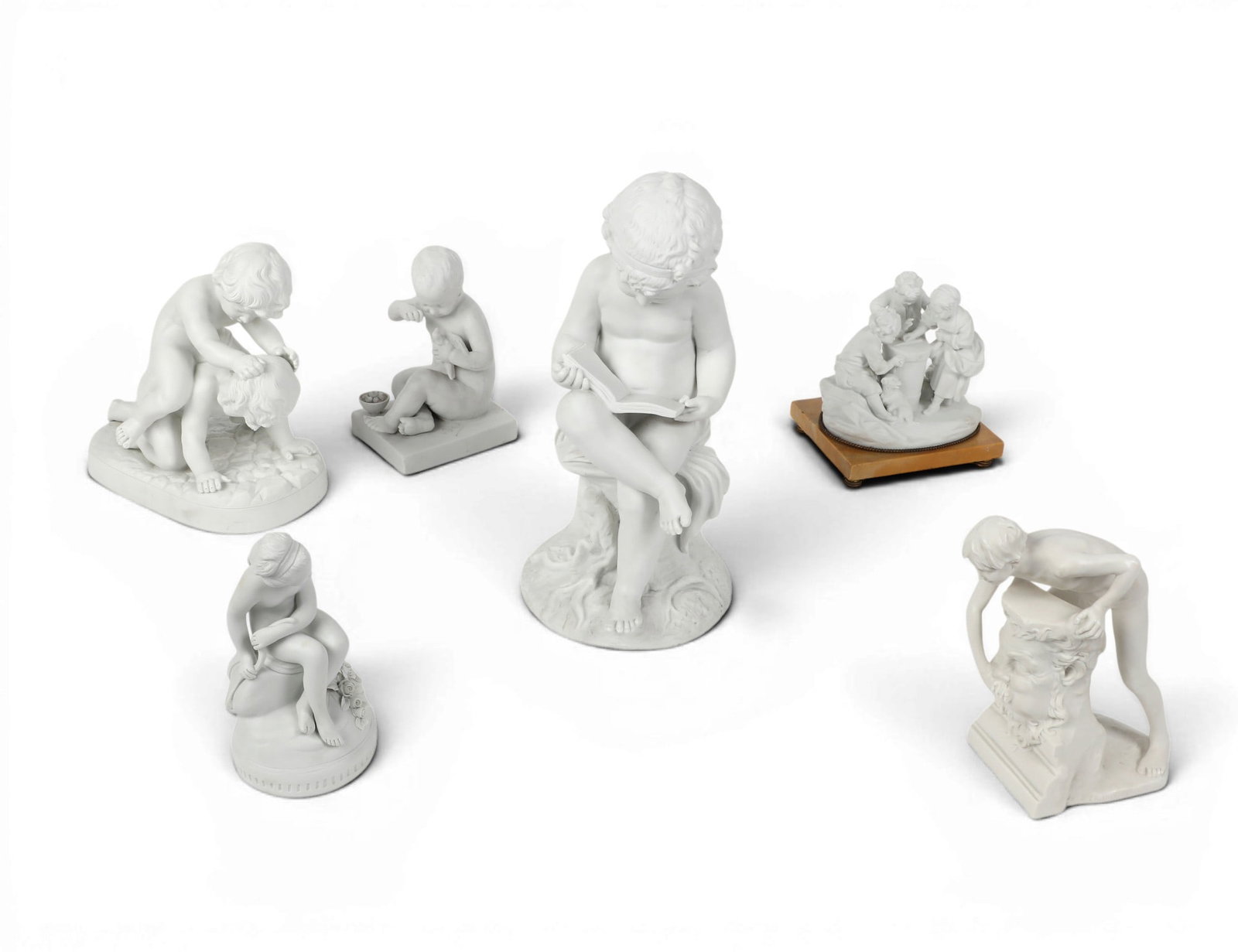 Six bisque porcelain figural groups, Samson, Sevres, and other makers, late 19th/early 20th century: Six bisque porcelain figural groups Samson, Sevres, and other makers late 19th/early 20th century Comprising a Samson figure of Psyche hiding the bow of love, after Etienne Maurice Falconet (1716-1791