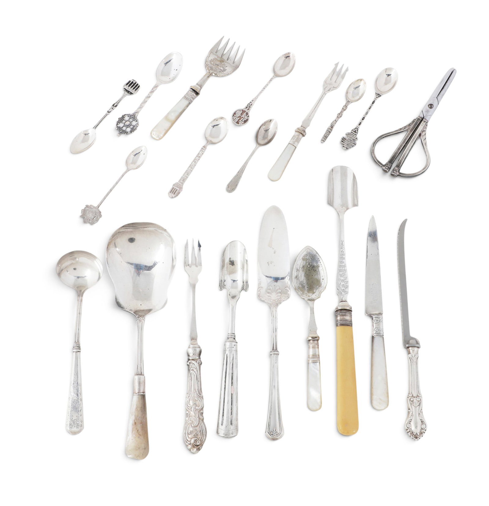 A group of twenty servings pieces and spoons, some with sterling handles (1 of 5)