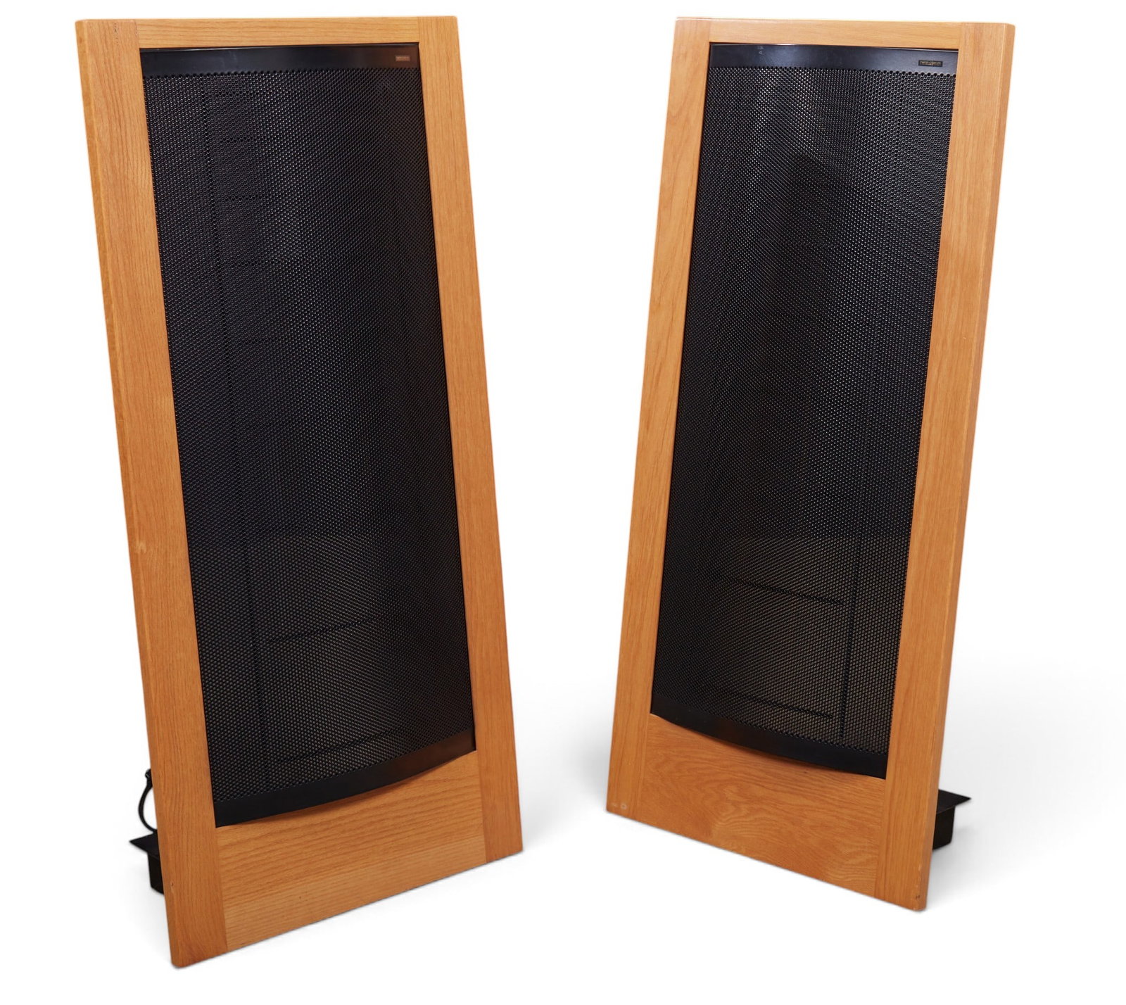 A pair of vintage freestanding loudspeakers by Martin Logan CLS: A pair of vintage freestanding loudspeakers by Martin Logan CLS height 57 x width 28 x depth 12 in. (144.8 x 71.1 x 30.5 cm.)