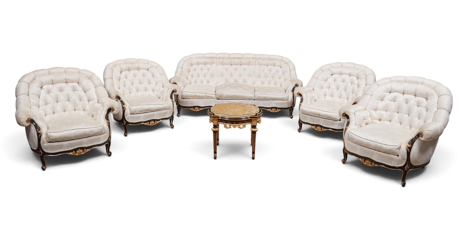 A five piece ebonized and gilt wood salon set and an end table with marble inset: A five piece ebonized and gilt wood salon set and an end table with marble inset Sofa: height 36 x width 71 x depth 31 in. (91.4 x 180.3 x 78.7 cm.)