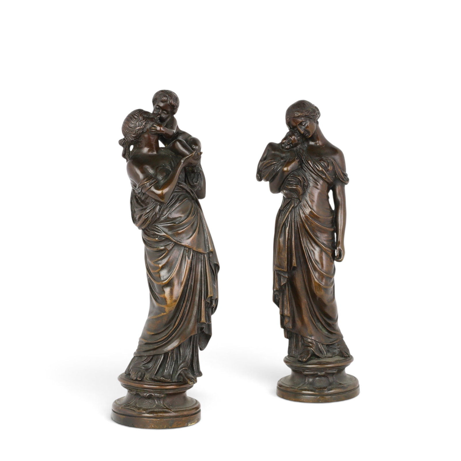 A pair of patinated bronze figures of a mother and infant, after Charles Cumberworth (French, 1811 -: A pair of patinated bronze figures of a mother and infant after Charles Cumberworth (French, 1811 - 1852) circa 1900 larger height 13 3/4in (35cm); width 3 3/4in (9.5cm); depth 4in (10cm)
