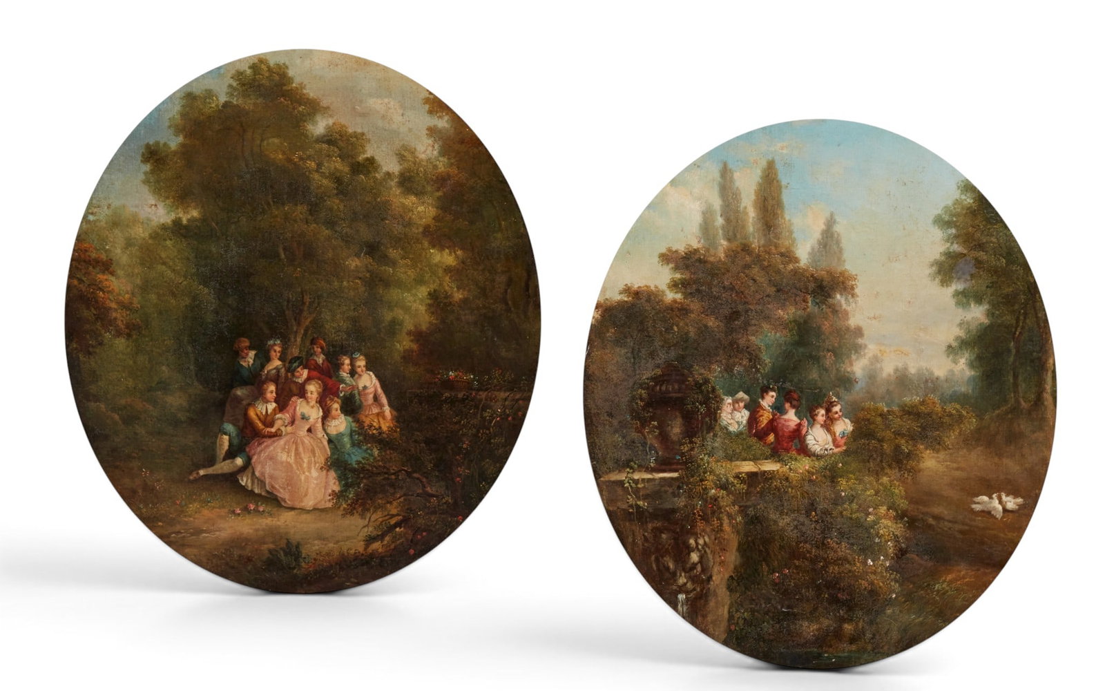 A pair of 19th century framed oval paintings featuring pastoral scenes.: A pair of 19th century framed oval paintings featuring pastoral scenes. Framed: 24 x 20 1/2 in. (61 x 52.1 cm.)