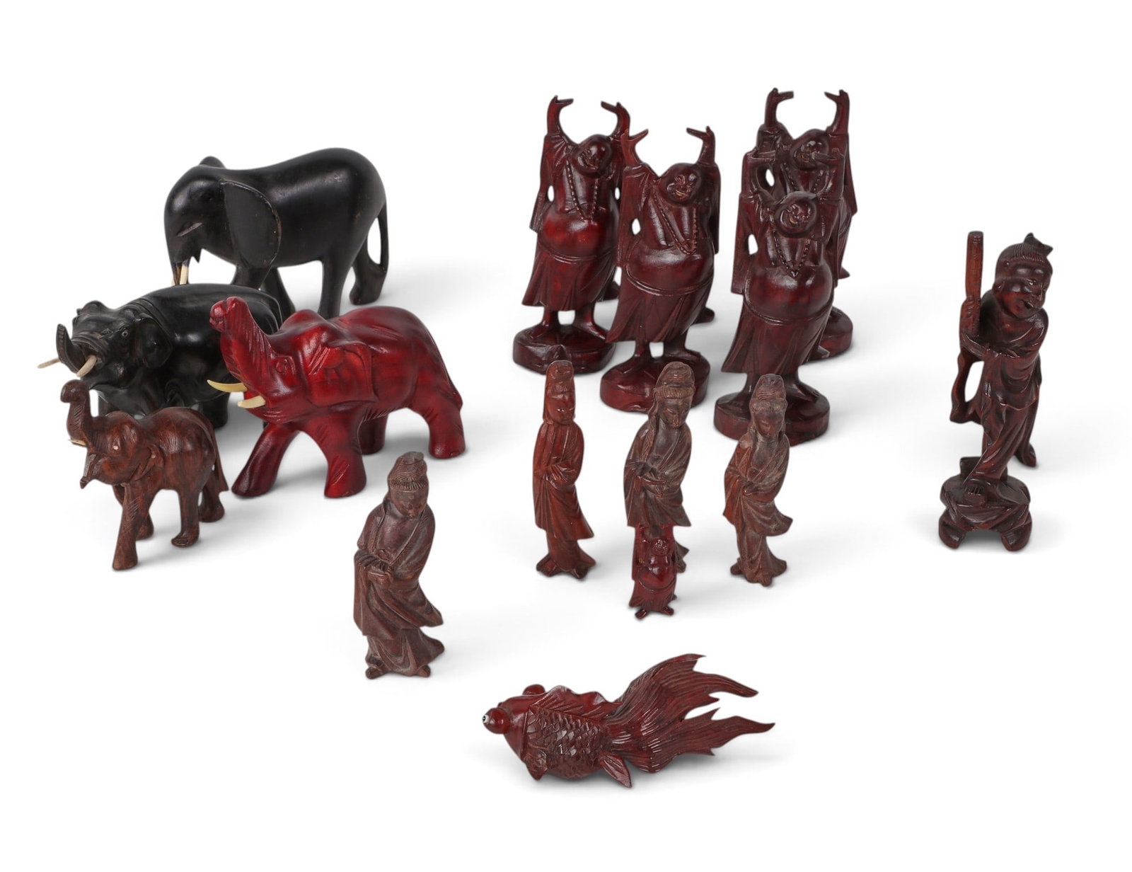 A group of fifteen Asian carved wood figures (1 of 4)