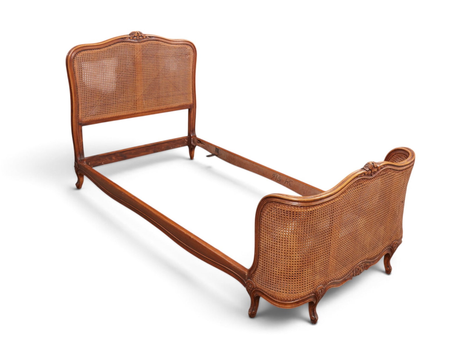 A cane back bed - 3