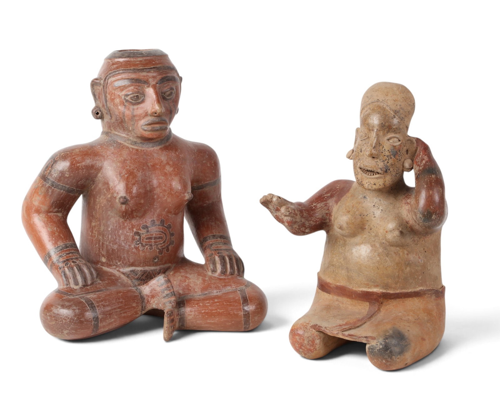 Two large Pre-Columbian style Meso-American polychrome clay seated effigy figures: Two large Pre-Columbian style Meso-American polychrome clay seated effigy figures largest: 18 x 15 x 11in (46 x 38 x 28cm)
