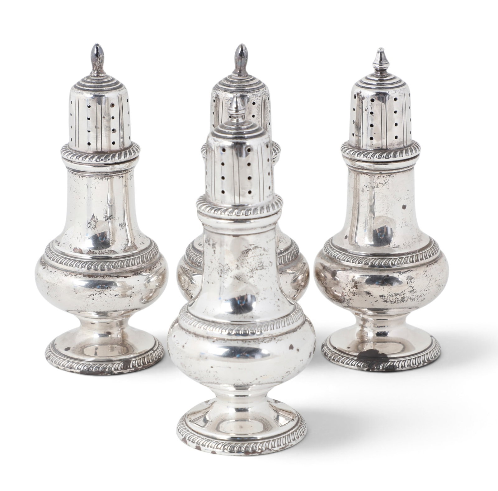 A set of four sterling silver casters: A set of four sterling silver casters 10.45t oz (325g)