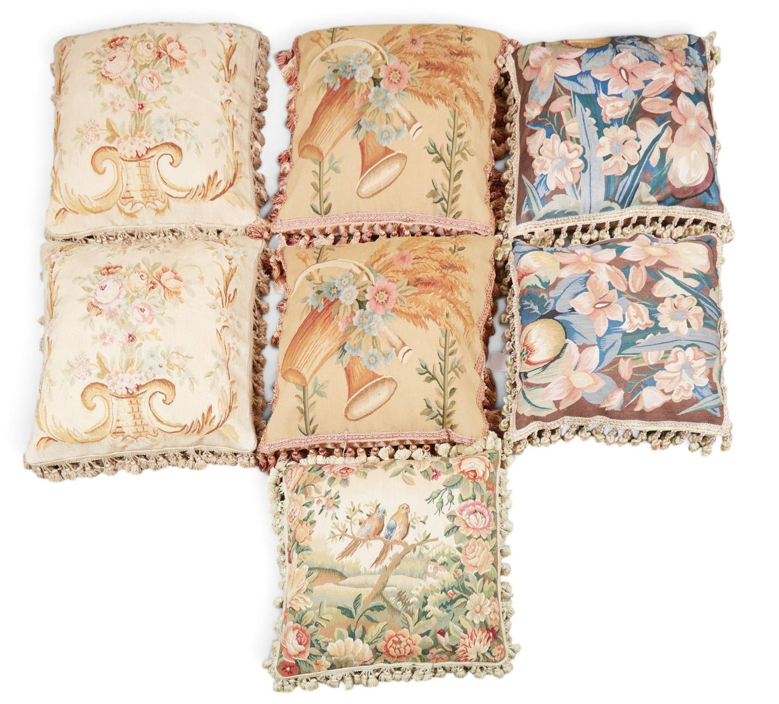 A group of seven Aubusson style needle point throw pillows: A group of seven Aubusson style needle point throw pillows Largest: 20 x 20 in. (50.8 x 50.8 cm.)