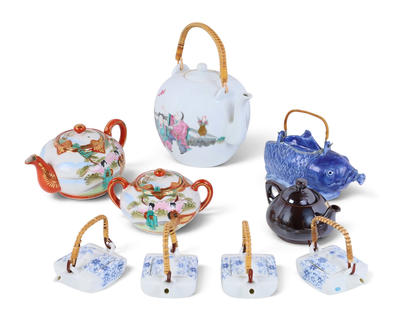 A group of nine Asian tea ware articles: A group of nine Asian tea ware articles Largest Teapot: height 9 x width 9 in. (22.9 x 22.9 cm.)
