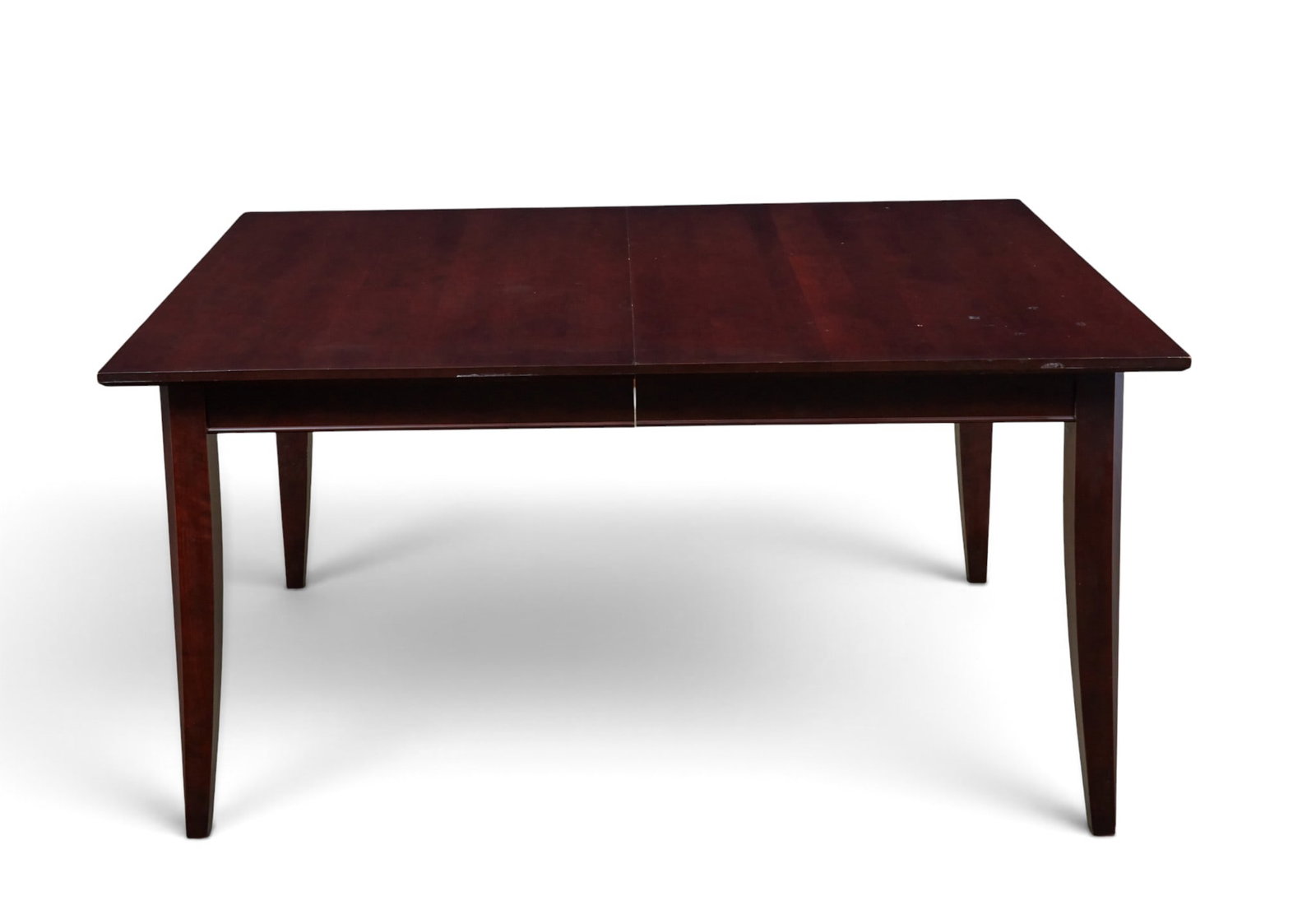 A dining room table with one leaf - 2