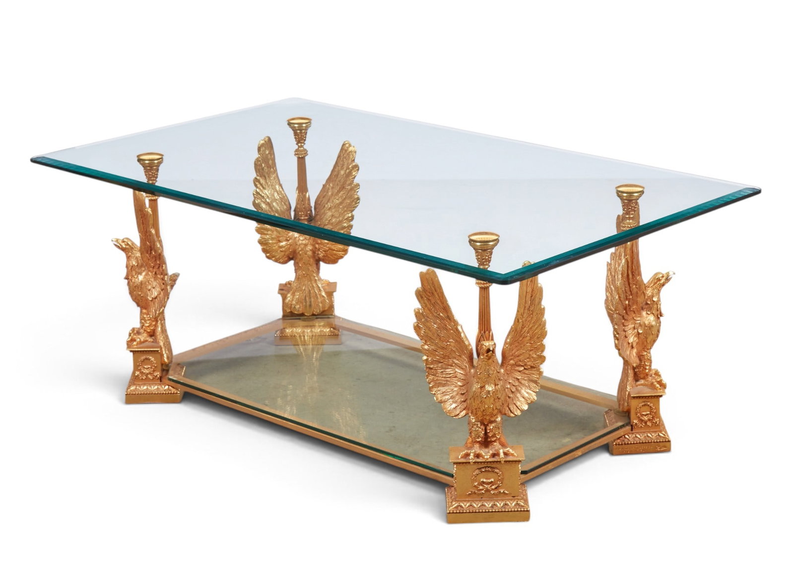 An Italian signed glass top coffee table: An Italian signed glass top coffee table height 20 x length 51 x width 29 1/2 in. (50.8 x 129.5 x 74.9 cm.)