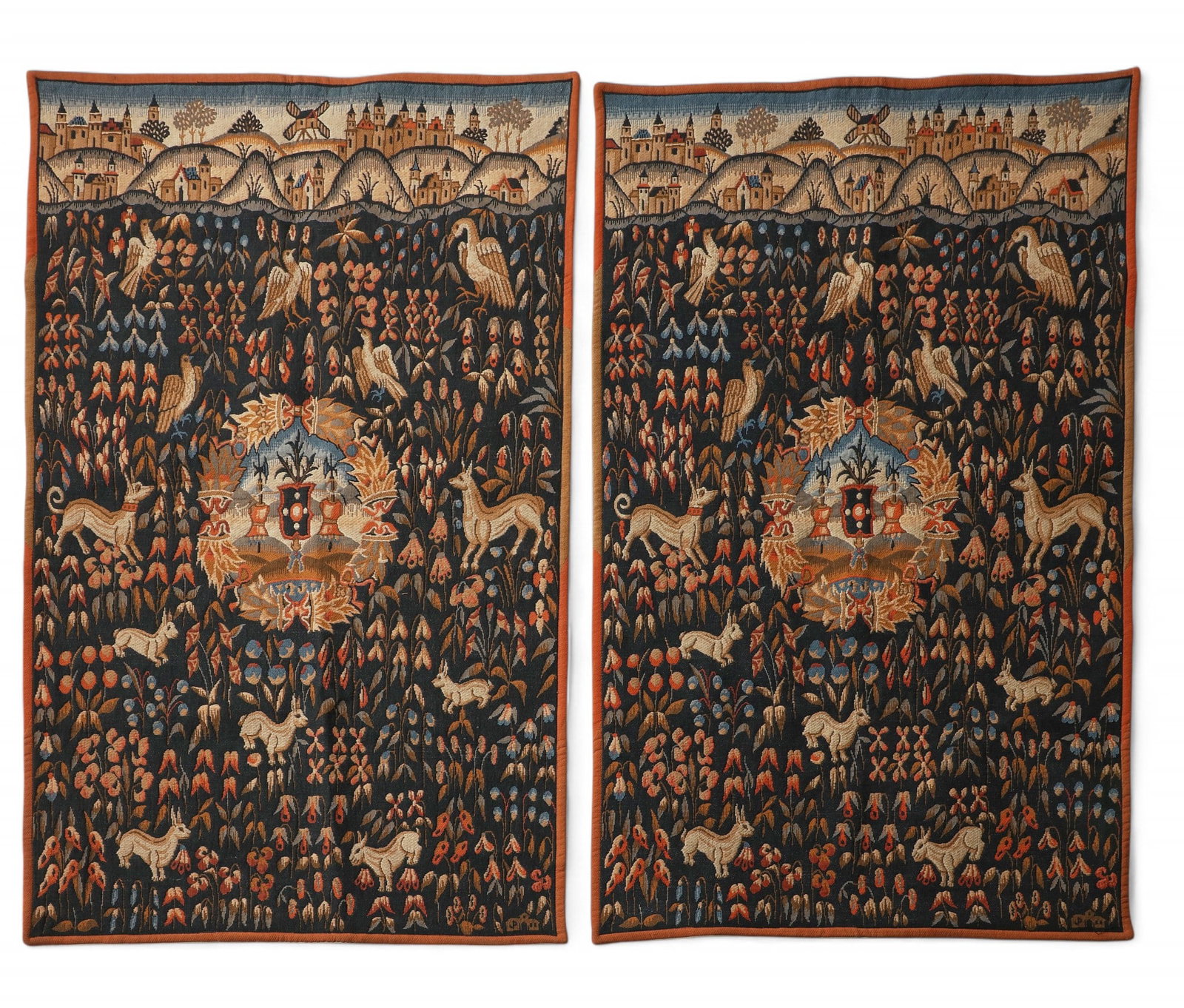 A pair of French Renaissance style machine made Point de l'Halluin armorial tapestry panels,: A pair of French Renaissance style machine made Point de l'Halluin armorial tapestry panels Tapisseries de Flandres modern Each with factory patch to reverse. 52 1/2 x 36in (133.5 x 91.5cm)