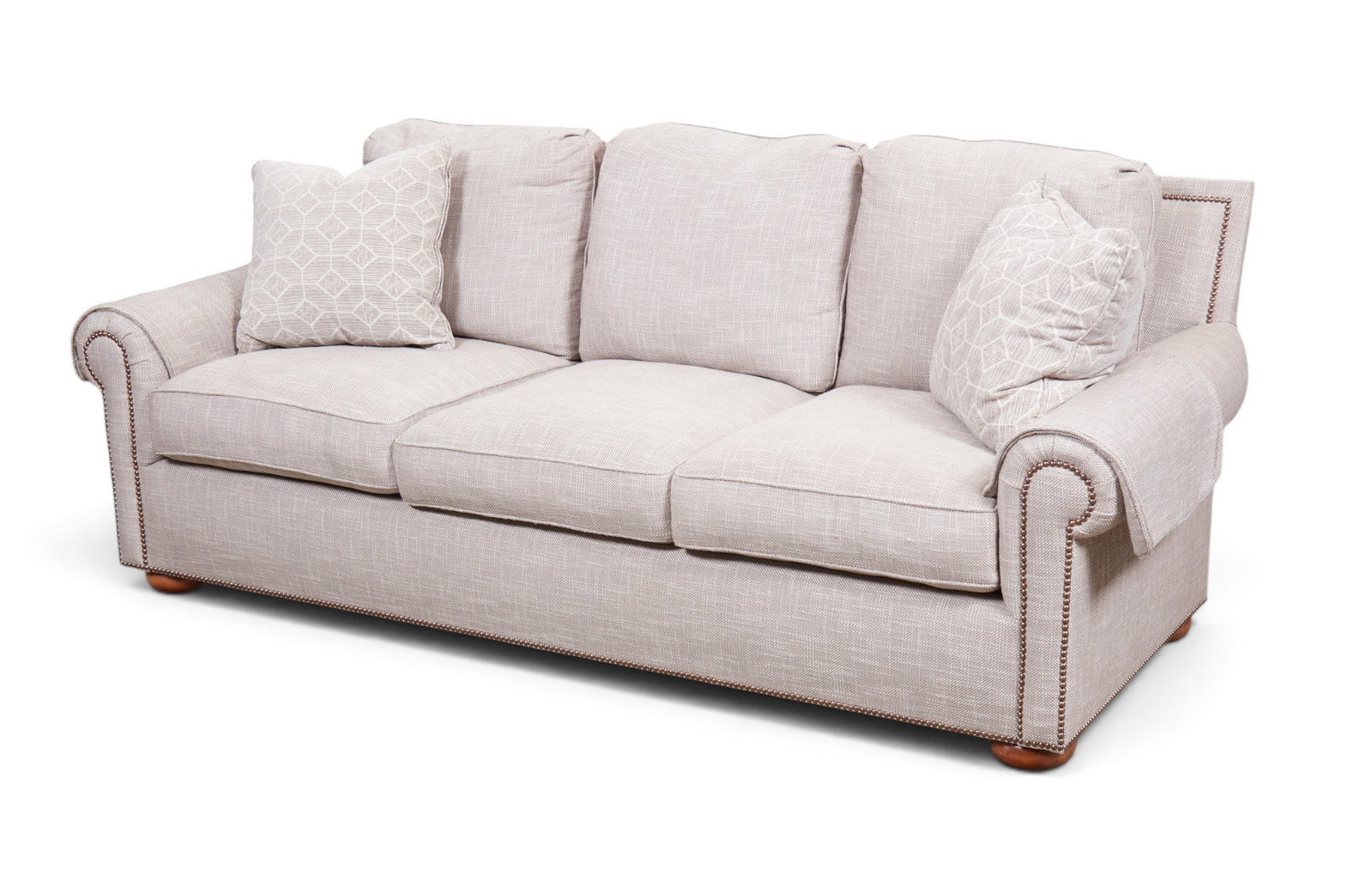 A grey upholstered sofa: A grey upholstered sofa height 34 1/2 x width 89 x depth 40 in. (87.6 x 226.1 x 101.6 cm.)