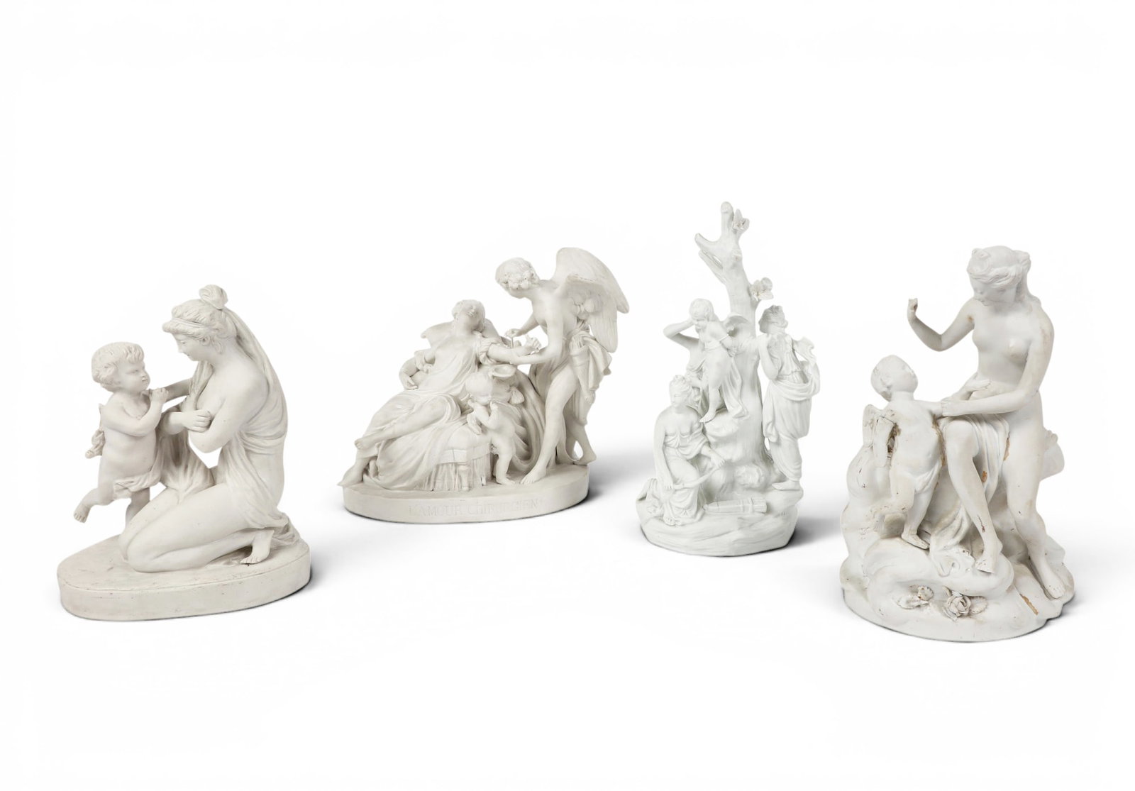 Four bisque porcelain allegorical figural groups, Sevres and other makers, late 19th/early 20th: Four bisque porcelain allegorical figural groups Sevres and other makers late 19th/early 20th century Comprising two Sevres groups including the Three Graces distressing Cupid and L'Amour Chirurgien, 