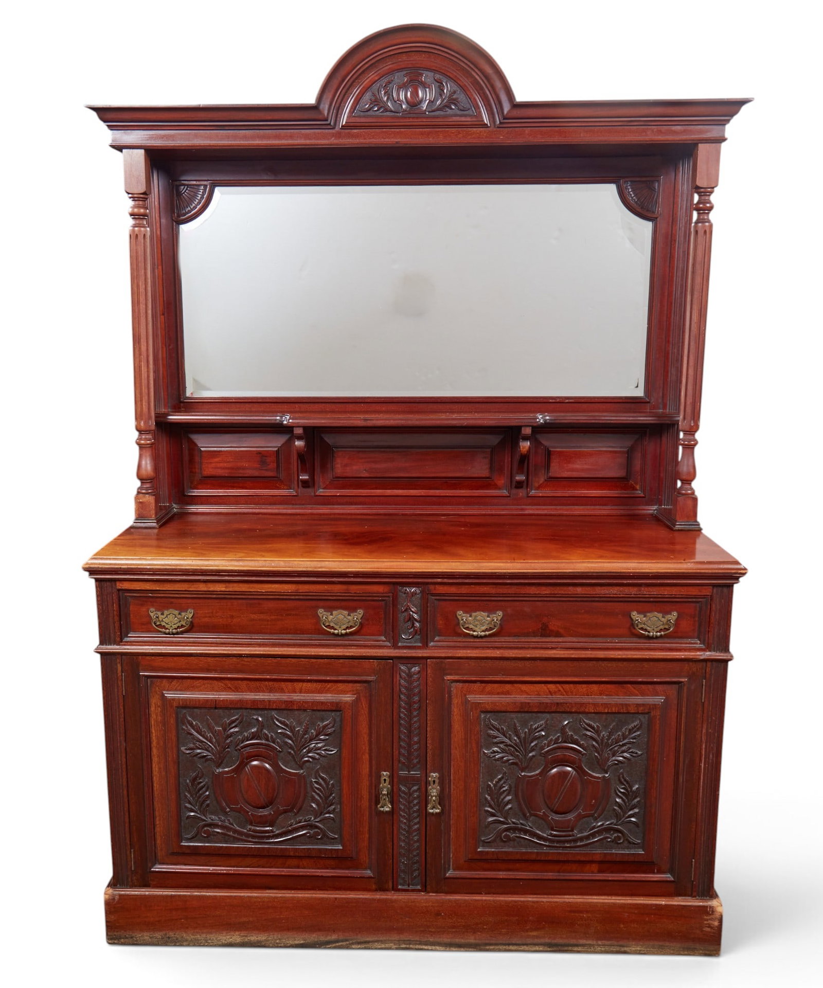 A Victorian two part sideboard with carved cabinet doors and large upper mirror. (1 of 6)