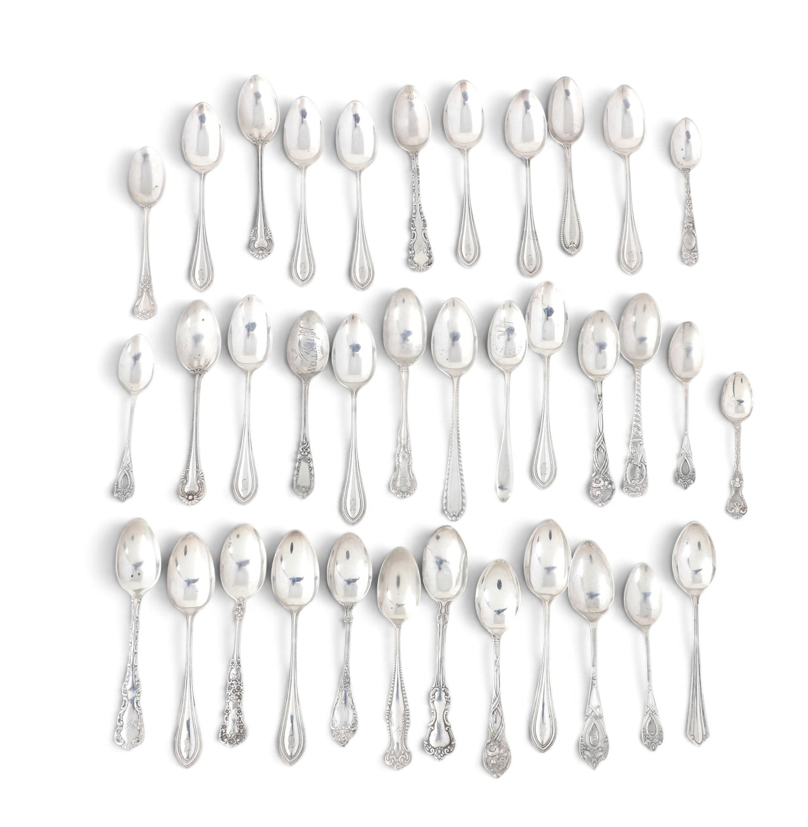A group of 36 sterling silver teaspoons by various makers: A group of 36 sterling silver teaspoons by various makers 23.50t oz (731g)