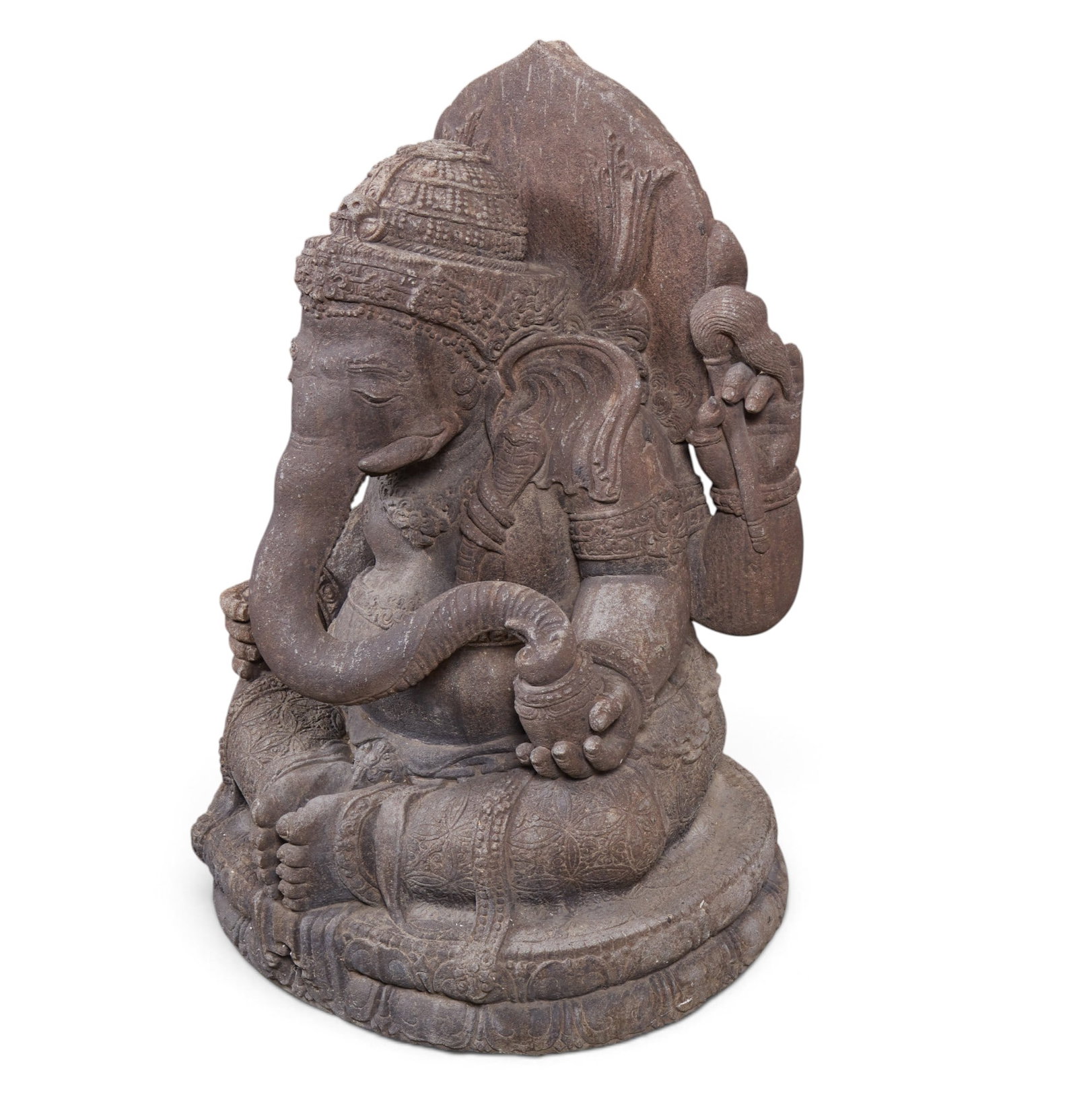 A hand carved stone of a Ganesha: A hand carved stone of a Ganesha height 40 x width 24 x depth 20 in. (101.6 x 61 x 50.8 cm.)