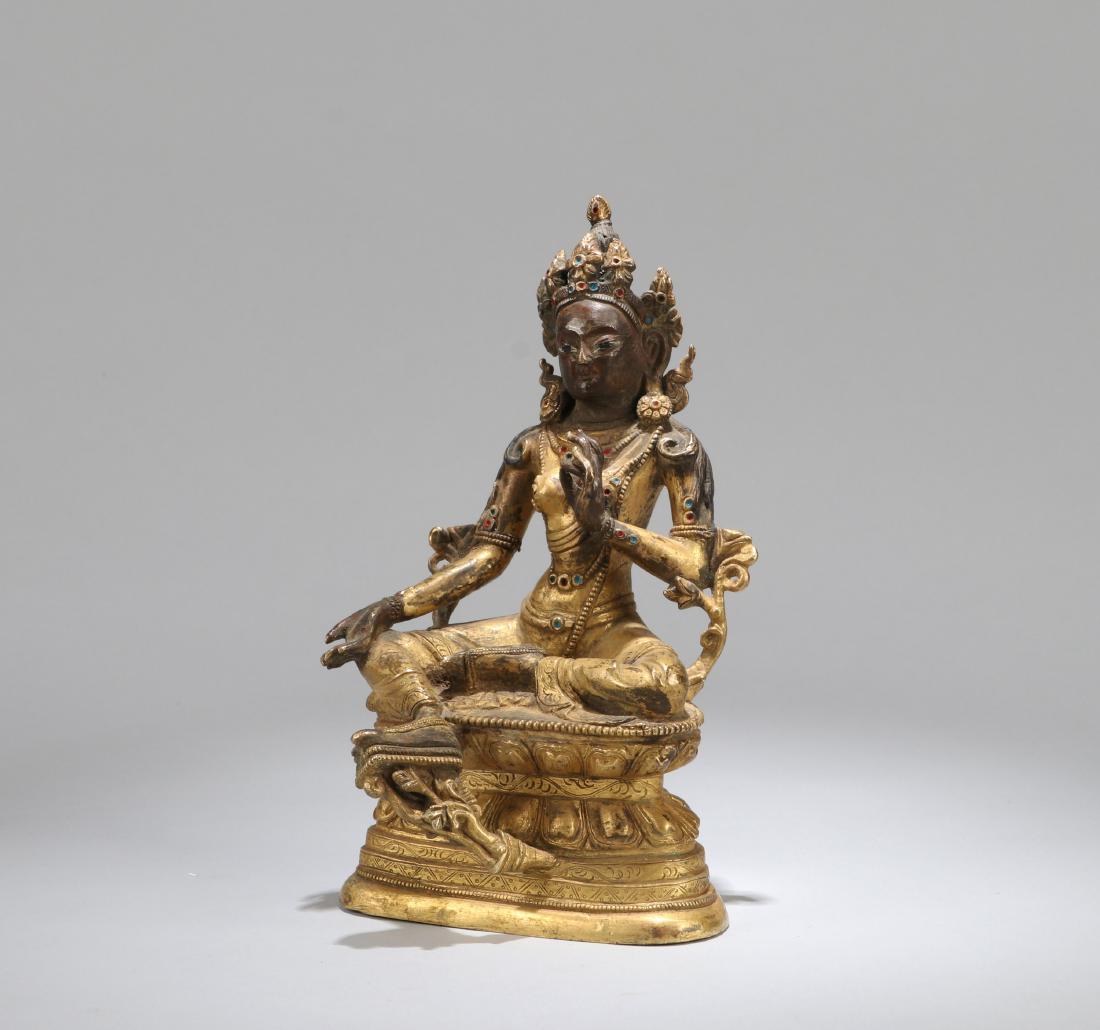 A CHINESE GILT BRONZE GREEN TARA, QING DYNASTY (1 of 8)