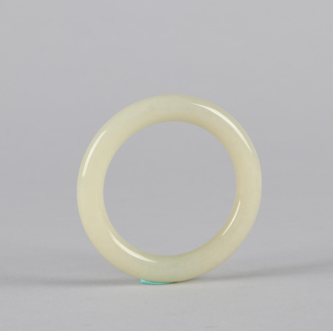 A CHINESE JADE BANGLE, QING DYNASTY (1 of 5)