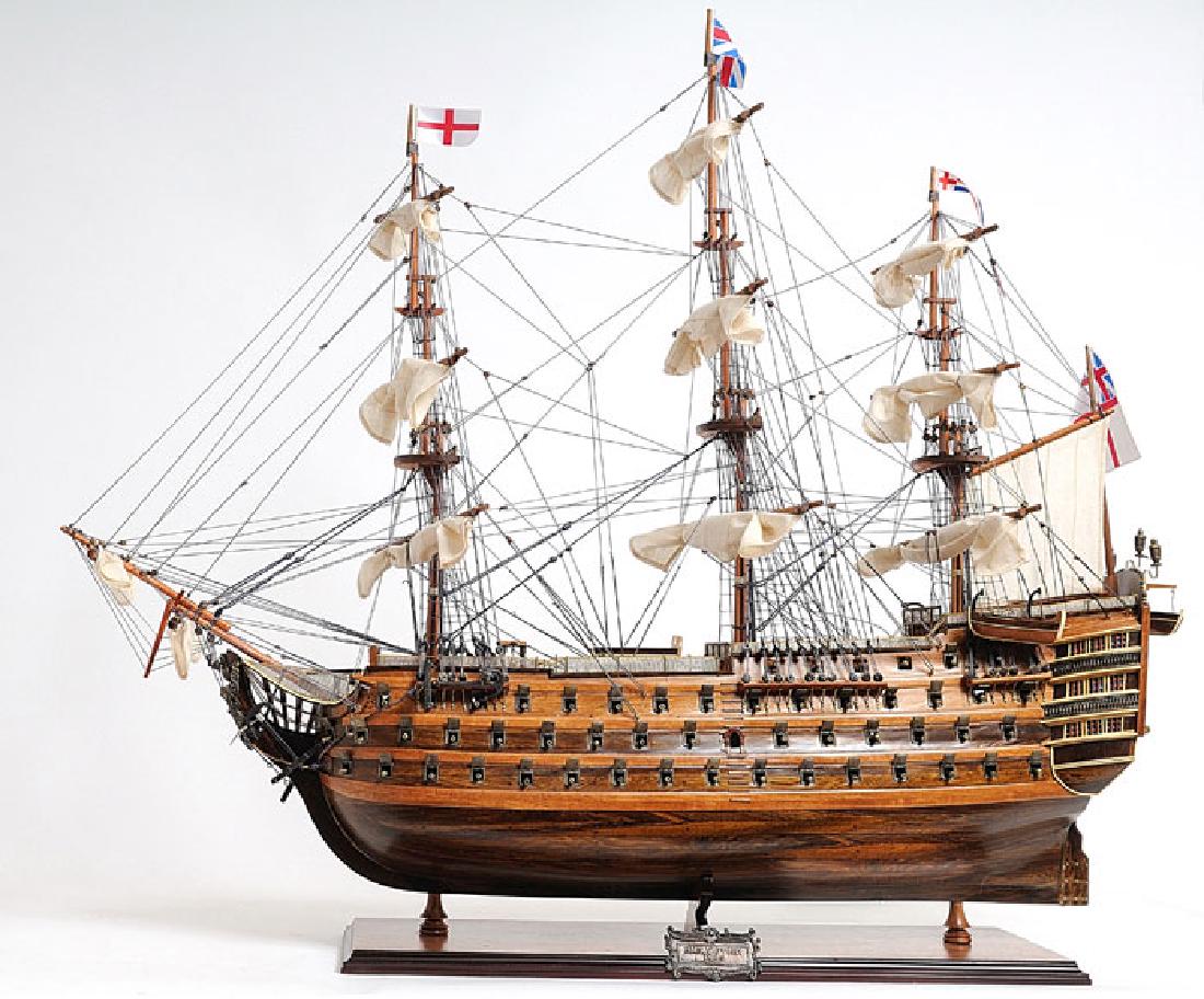 HAND MADE WOODEN HMS Victory Exclusive Edition W/COA: HAND MADE WOODEN HMS Victory Exclusive Edition W/COA **|**|** Dimensions: 30Lx10x27H inches. Description: his is a museum quality version of The HMS Victory. The H.M.S VICTORY was launched on 7th May 