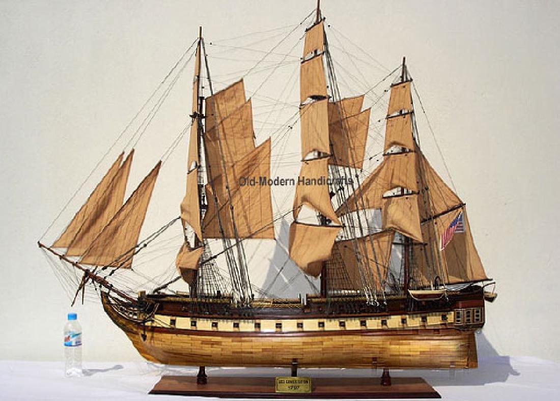 HAND MADE WOODEN USS Constitution XL W/COA: HAND MADE WOODEN USS Constitution XL W/COA **|**|** Dimensions: 130L x 28W x 130H (cm) Description: She was launched at Boston on October 21 1797... Our model is scratch built from hard wood planks on