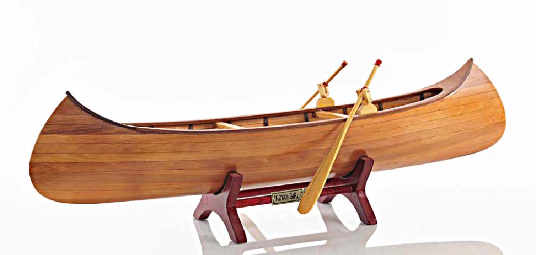 Indian girl canoe L60: Indian girl canoe L60 **|**|** The famous canoe designer/builder J. H. Rushton introduced the Indian Girl model in 1902. To quote Mr. Rushton The Indian Girl is strong light safe though speedy gracefu