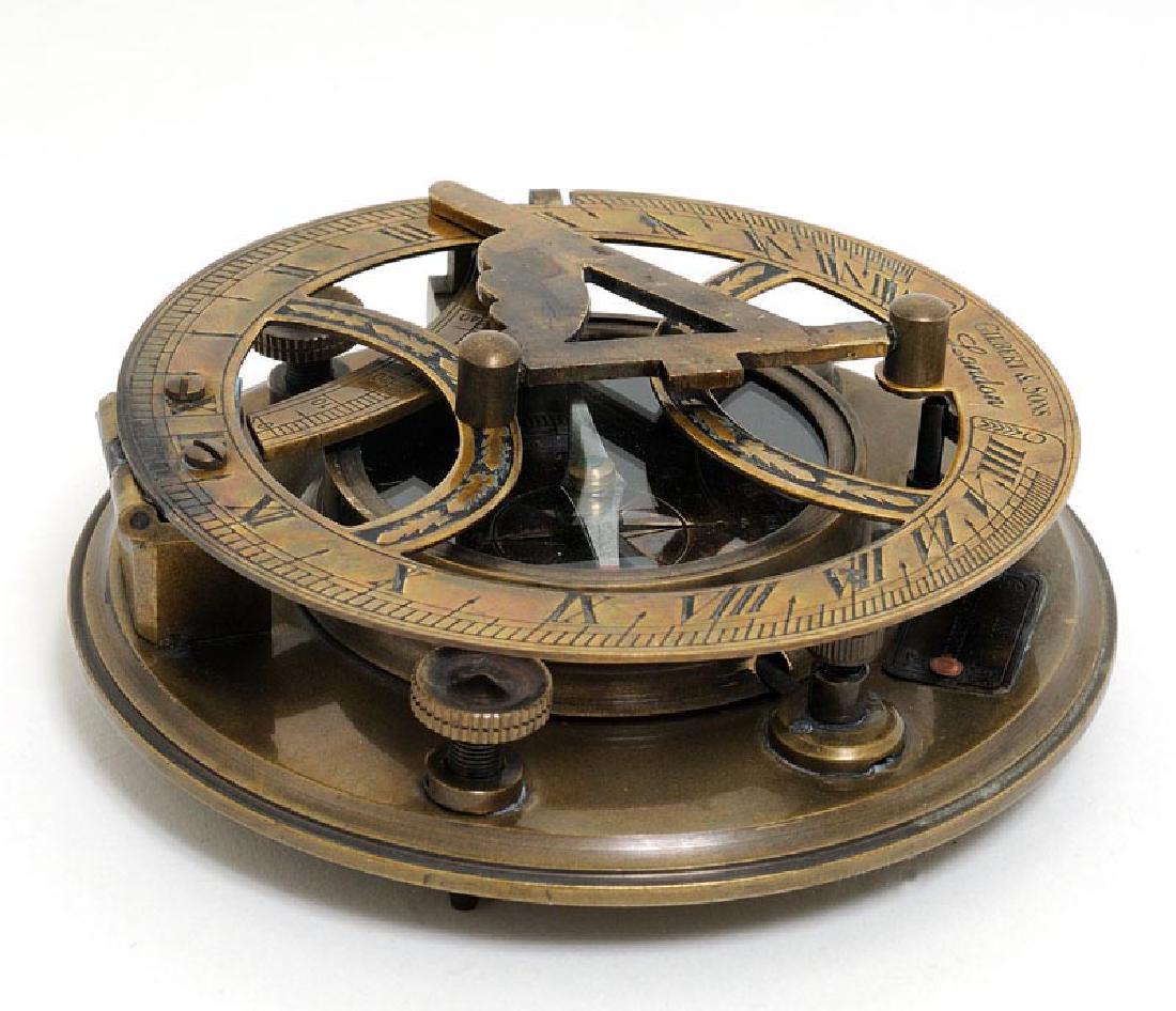 Sundial Compass in wood box: Sundial Compass in wood box **|**|** This is a fully functional sundial compass. It is made of high quality brass. Each component is crafted with the finest craftsmanship. Contains a foot screw and ci