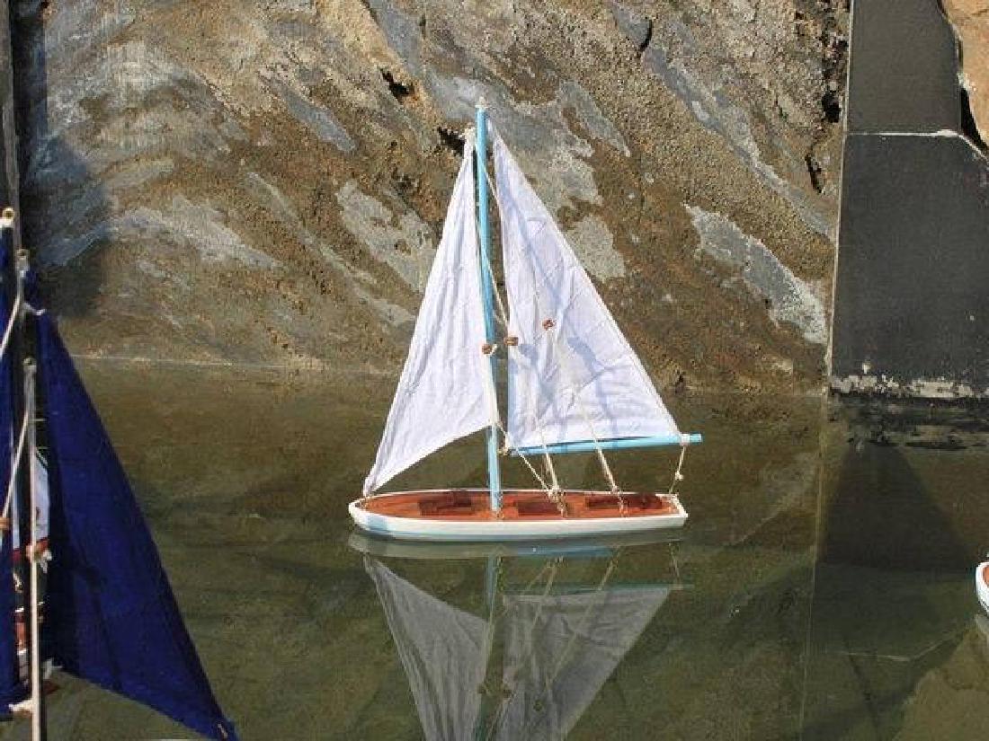 Wooden It Floats 21in. - Light Blue Floating Sailboat M: Wooden It Floats 21in. - Light Blue Floating Sailboat Model **|**|** Our new?It Floats?Light Blue 21in. - White Sails?model salboat is freshly designed with increased craftsmanship and is our debut fl