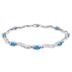 2.16 Carat 14K Solid White Gold Tennis Bracelet Diamond: 2.16 Carat 14K Solid White Gold Tennis Bracelet Diamond Blue Topaz **|**|** Blue Topaz / Diamond; Metal Color:White Gold; Condition: New With Tags; TWC: 2.16 ;Metal: 14 K. Solid white Gold ;Stone: Nat