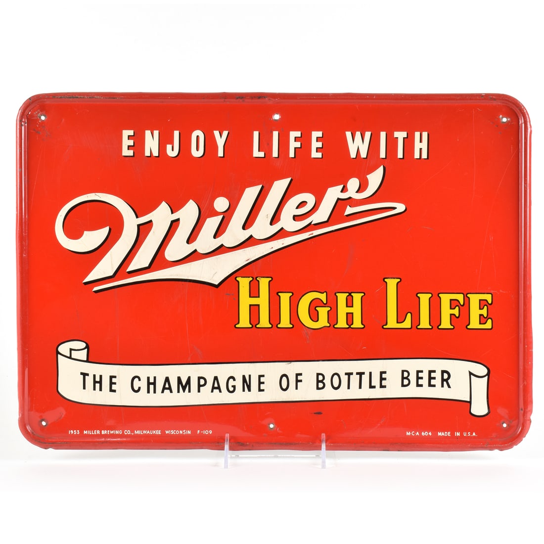 Miller High Life 1950s Embossed Tin Sign 2 OF 2: Business Name: Miller Brewing Co., Milwaukee, Wisconsin Manufacturer/Plant: Unknown