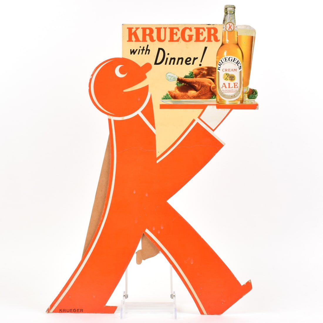 Kruegers Ale 1930s Diecut Cardboard Sign KRUEGER DINNER BALDY K-MAN: Brewer/Business Name: G. Krueger Brewing Co., Newark, New Jersey Manufacturer/Plant: Unknown Date of manufacture: