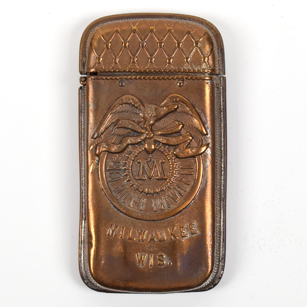 Fred Miller Pre-Prohibition Match Safe EAGLE: Brewer/Business Name: Fred Miller Brewing Co., Milwaukee, Wisconsin Manufacturer/Plant: Unknown Date of manufacture: Pre-Prohibition Contents/Type: N/A Dimensions: 2 w x 3-1/4 h x 1 d. 