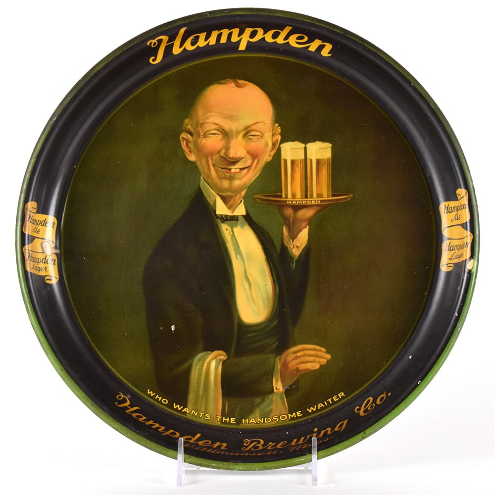 Hampden Brewing 1930s Serving Tray HANDSOME WAITER YELLOW TEXT: Brewer/Business Name: Hampden Brewing Co., Willimansett, Massachusetts Manufacturer/Plant: Unknown Date of manufacture: circa 1930s Contents/Type: N/A Dimensions: 13 inches. Comments/description:
