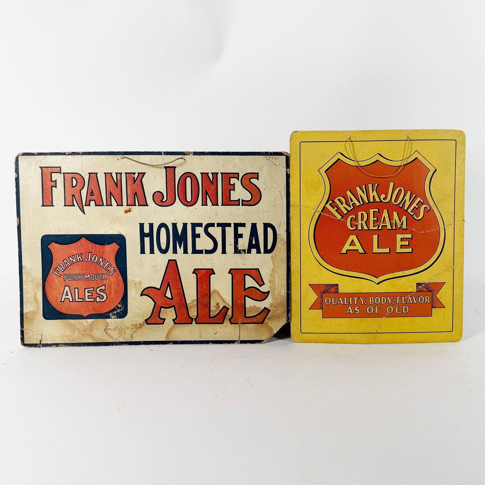 Two Frank Jones Ale Cardboard Advertising Signs RARE: Frank Jones Brewing. Portsmouth, New Hampshire. Two vintage advertising signs for Frank Jones Ale. One sign advertises 'Homestead Ale' and 'Portsmouth Ales', while the other prom